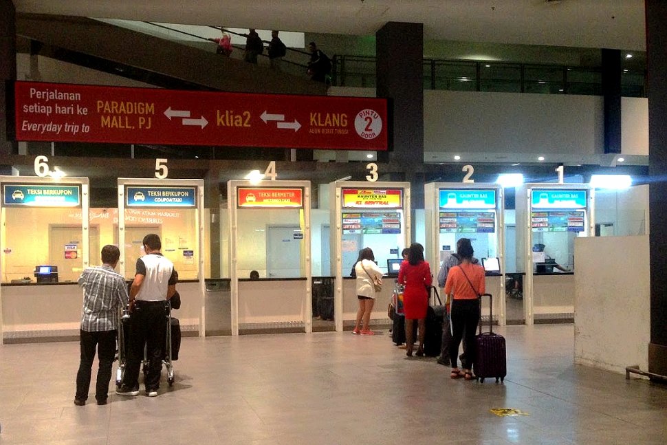 Passengers buying ticket at the ticketing counters