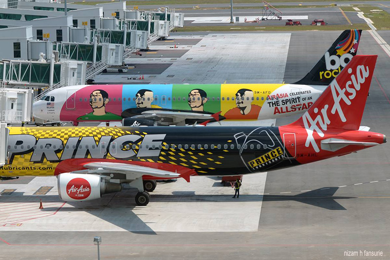 AirAsia's flights at the parking bays, Photo by Nizam Hakim