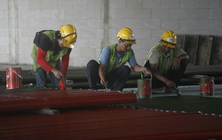 Workers preparing piping work, 29 Nov 2011