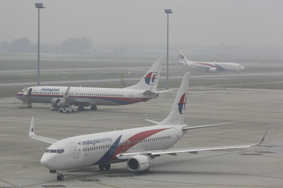 Widespread haze from forest fires in Indonesia's Sumatra and Borneo have only added to the woes of Malaysia's aviation sector.