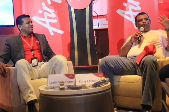 AirAsia Singapore CEO Logan Velaitham (left) and Fernandes explaining AirAsia's digitalisation plans to the media in Singapore today.