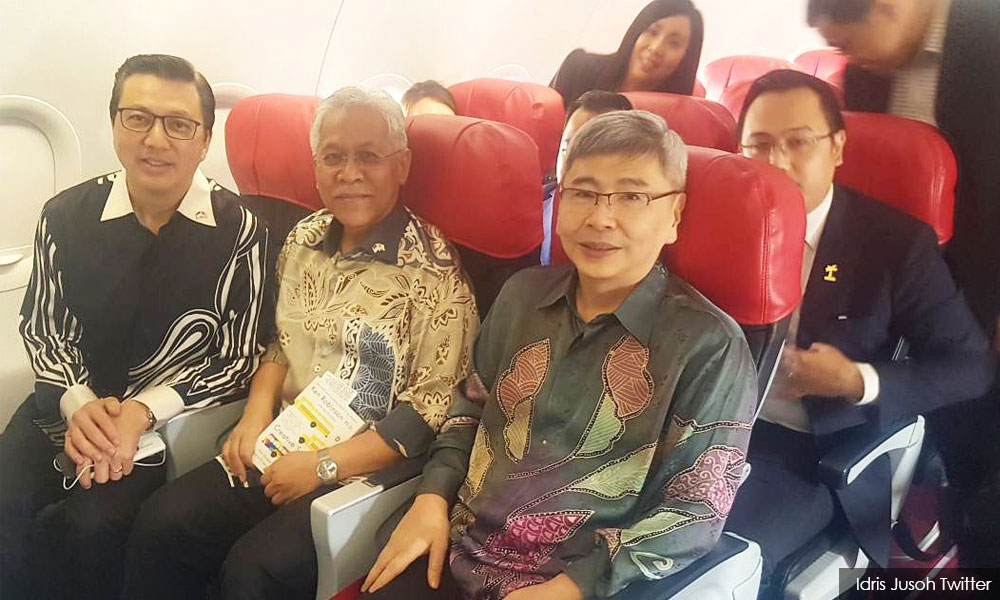 Ministers flying with AirAsia