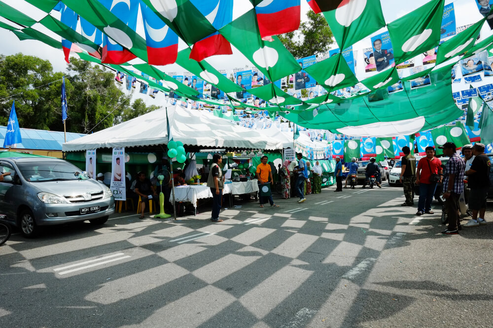 The colorful political party flags add a festive flair to the Malaysian general election.