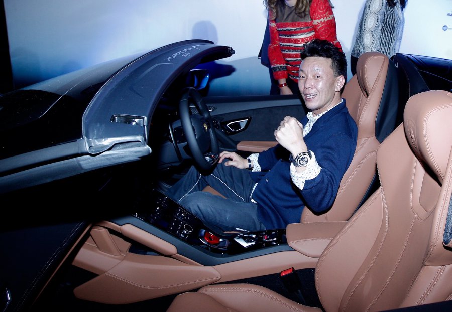Riyo Kawakami sits in his Lamborghini Huracan Spyder during the Malaysia Airports Holdings Bhd’s (MAHB) 25th Anniversary Shopping Campaign