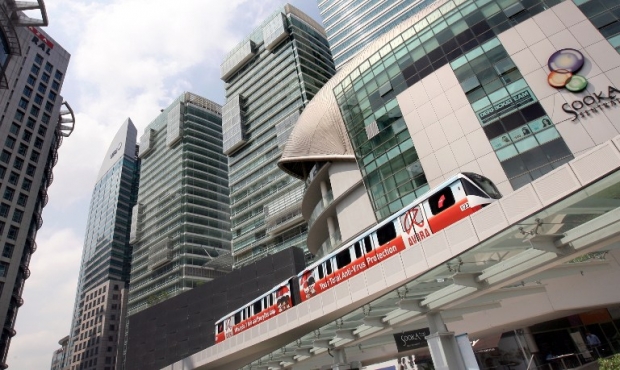 An LRT train passes the KL Sentral building in Kuala Lumpur