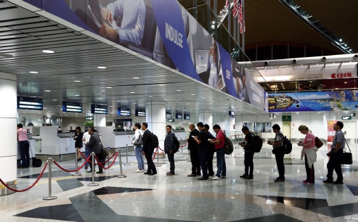 Travellers queuing up at the Immigration counter at Kuala Lumpur International Airport recently