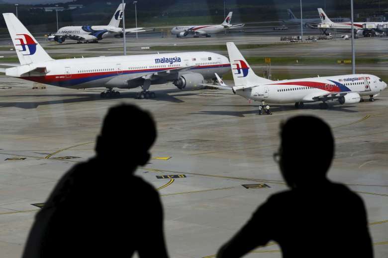 People viewing Malaysia Airlines aircraft at Kuala Lumpur International Airport in Sepang, Malaysia, on March 2, 2016. 