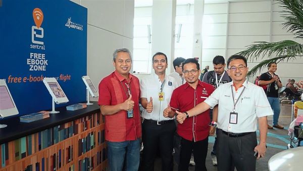 (From left) Malaysia Airports Holdings Berhad (MAHB) Commercial Services manager Raslan Shahrin, e-Sentral chief executive officer Faiz Al-Shahab, Syed Munawar and MAHB senior manager Mohd Fauzi Ahmad at the e-book kiosk at klia2.