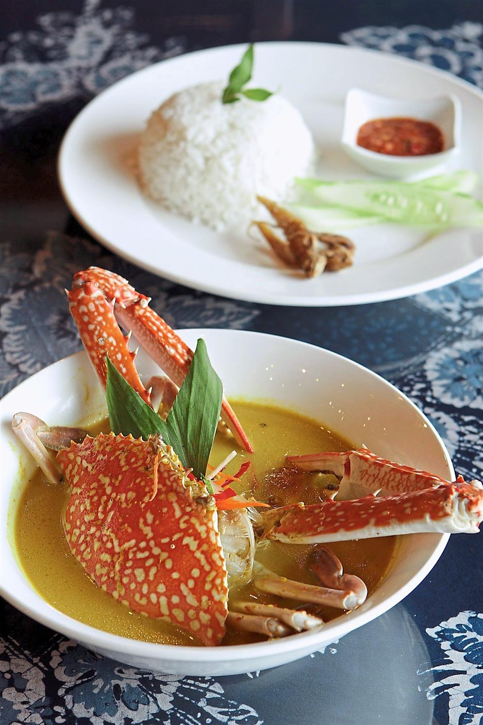 This dish might look tame but sure packs a punch with cili padi heat and soft, sweet crab meat.