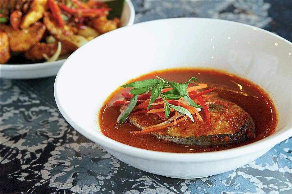 Spiciness is a running theme here but no one is complaining as the heat from this Asam Pedas Ikan Tenggiri keeps us warm in the cold air-conditioned dining area.