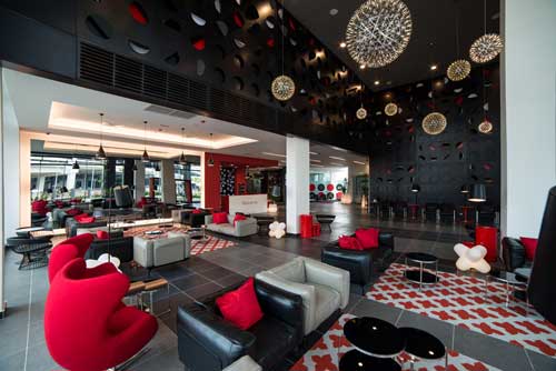 The spacious and tastefully designed lobby is the first of its kind in the Tune Hotels chain