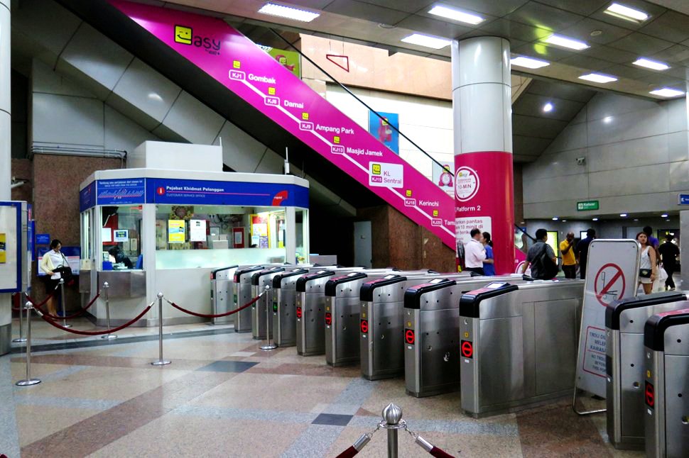 Ticket counter, entrance gates, and escalator access