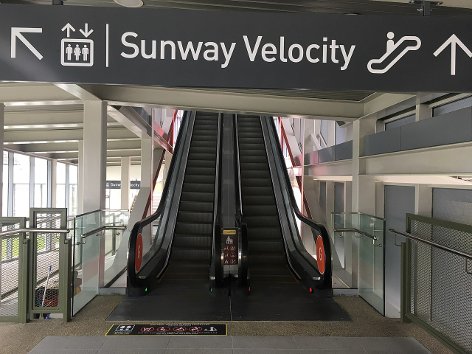 Escalators to the elevated pedestrian linway.
