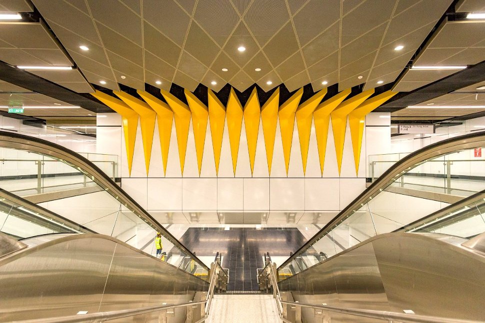 The ceiling above the escalator is decorated with 14-pointed star on the flag of Malaysia