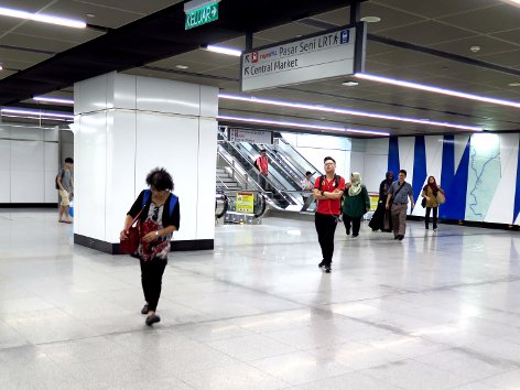 MRT station concourse level area towards the escalators to the pedestrian link bridge