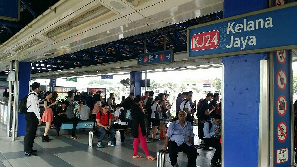 Commuters waiting at Kelana Jaya LRT Station