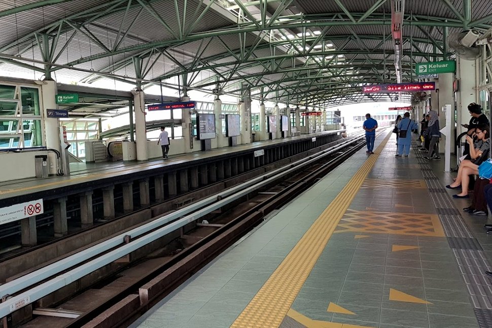 Commuters waiting at the boarding platform for LRT train