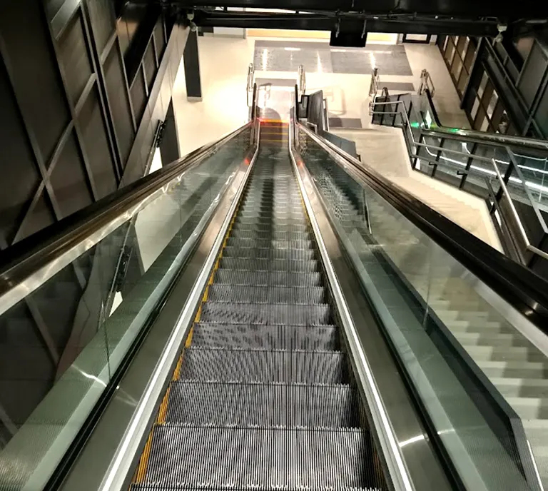 Escalators for movement between Concourse level and the Boarding platforms