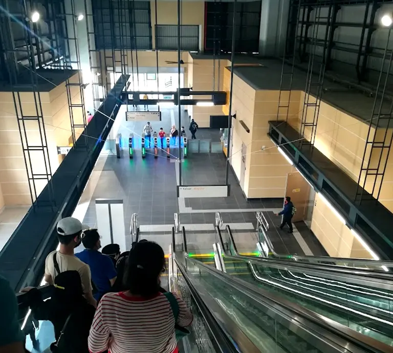 Escalator for movement between Concourse level and boarding platforms at Cyberjaya Utara MRT station