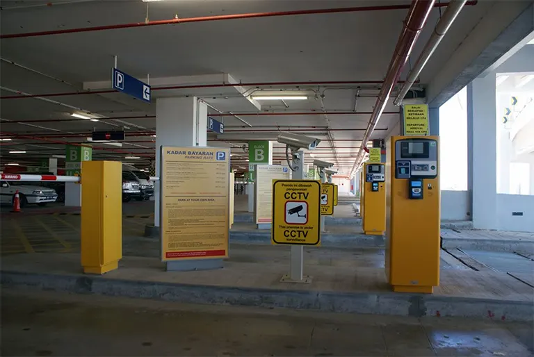 Ticketing machines and barrier gates