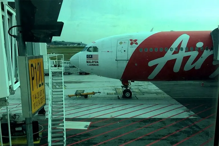 AirAsia flight approaching the gate