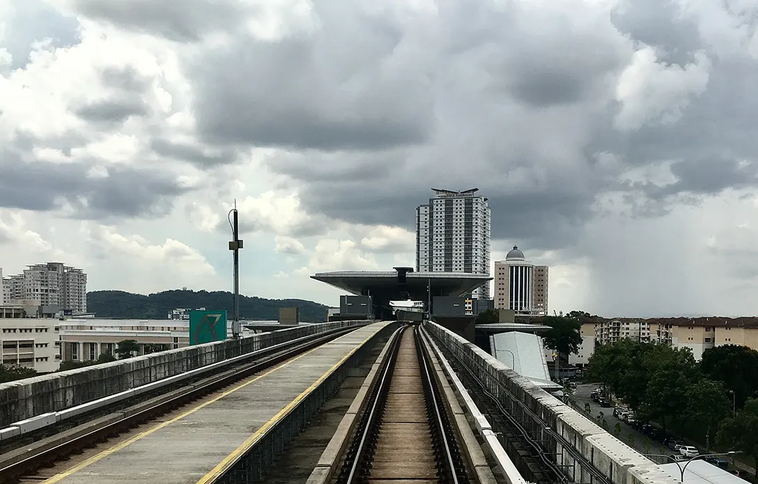 Kota Damansara MRT Station from train with the Tropicana Medical Centre and Segi University at left