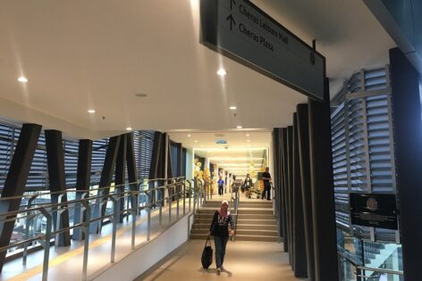 Pedestrian walkway connects the MRT station to the Leisure Mall shopping center