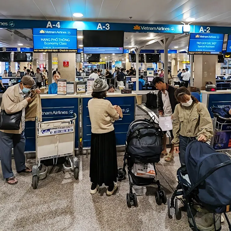 Passengers checking in at the counters