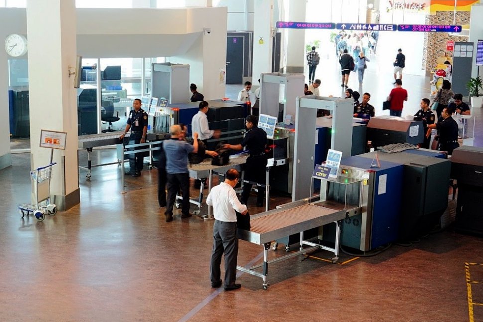 Officers conducting security check at the klia2's Pier