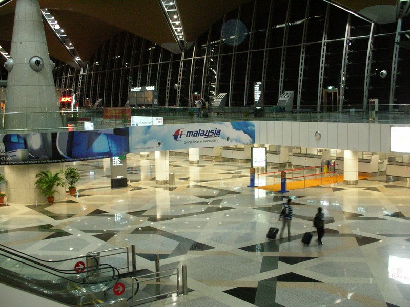 Walking toward immigration and customs check counters