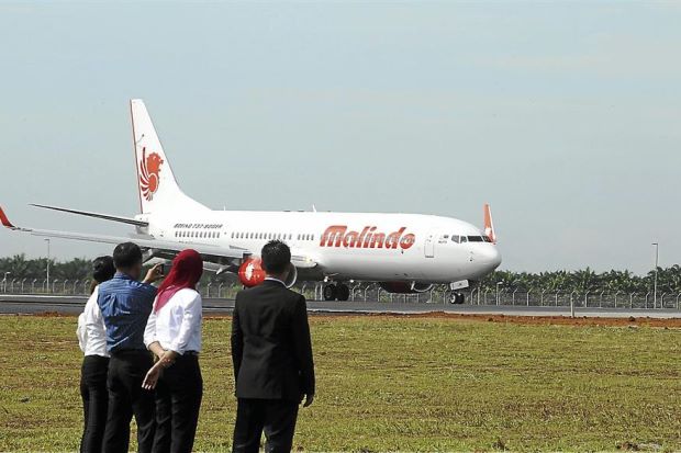 A Malindo Air plane doing a trial landing on klia2's run way.
