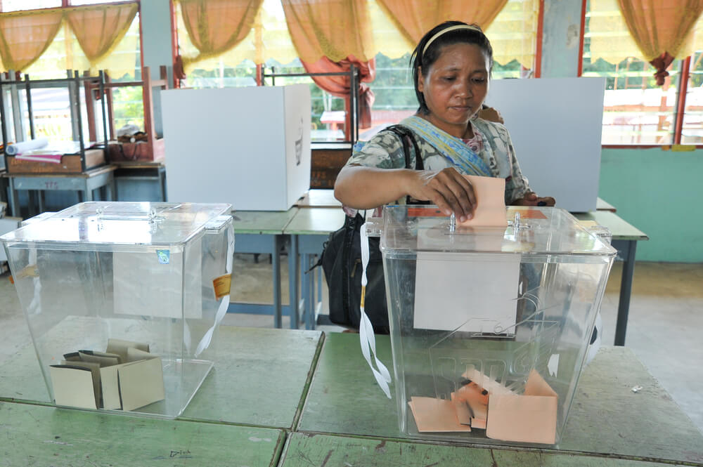 An unidentified Malaysian woman casts a vote during the 13th Malaysian general election on May 5, 2013, in Kiulu Sabah Malaysia