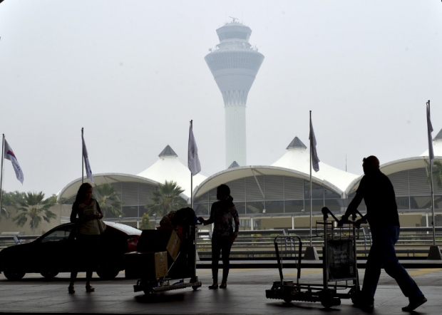 File picture shows reduced visibility at Kuala Lumpur International Airport (KLIA), due to the haze on September 26, 2015. ?Bernama pic