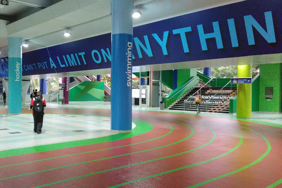 The concourse area of the station features sports-related quotes and the curve of the relay track.