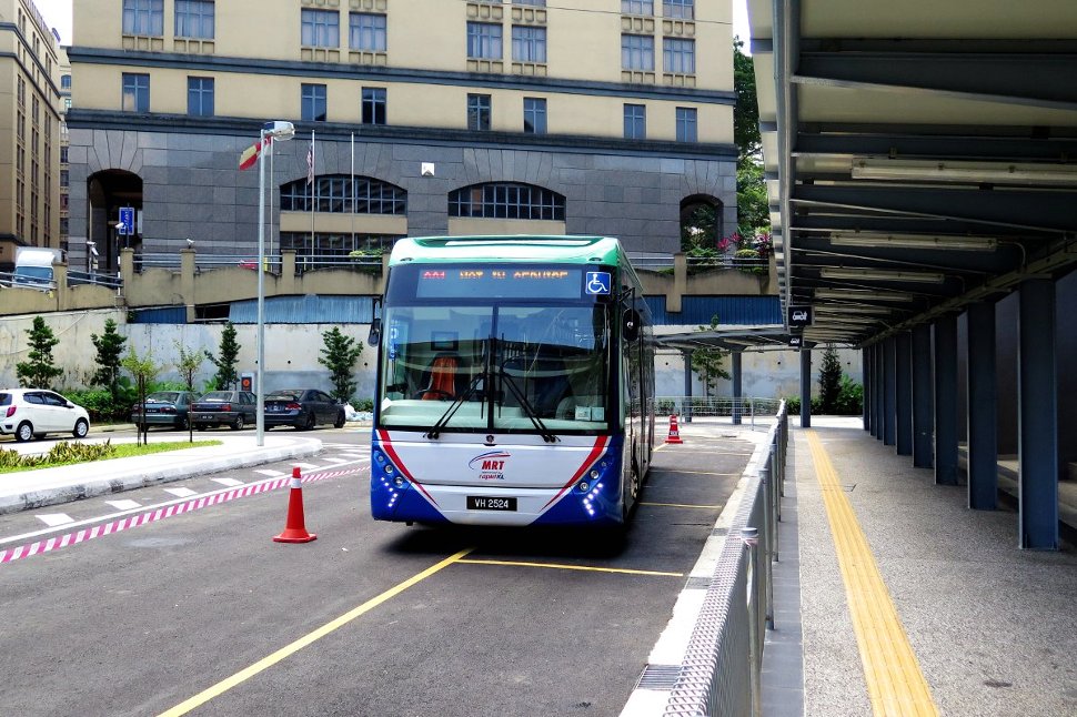 Feeder bus lining up near the entrance A