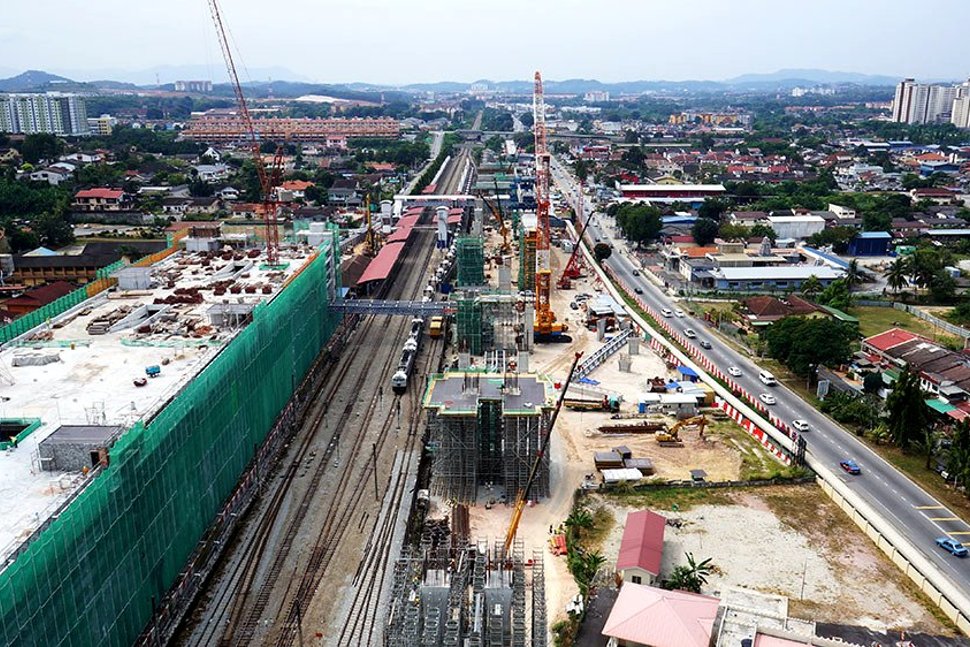 View of the construction of the Kajang MRT Station along Jalan Reko (right) and the Kajang Station Multi Storey Park and Ride Building on the left. Feb 2015