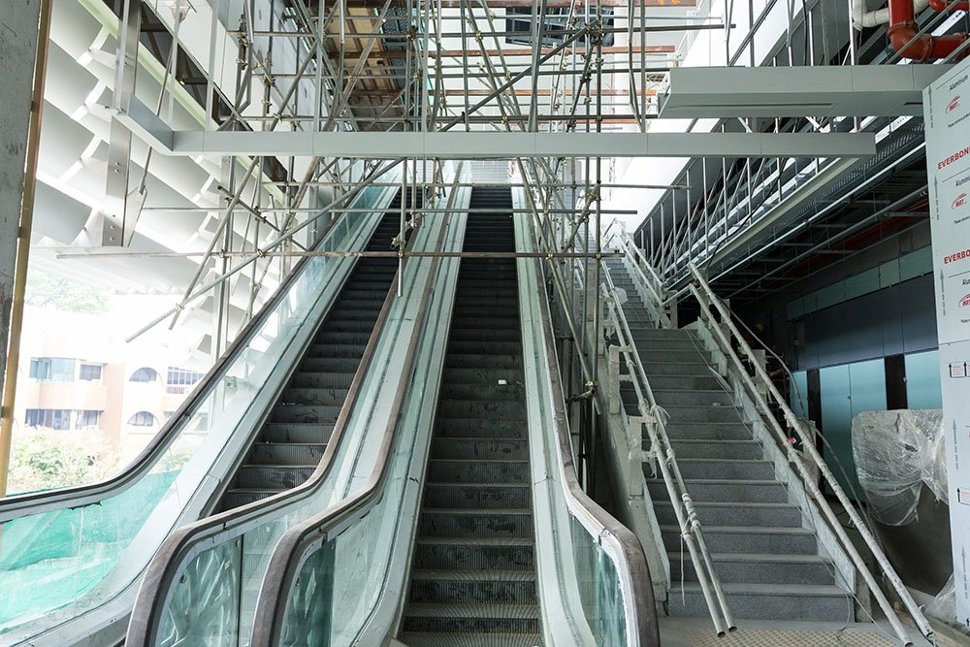 The escalators that lead up to the platform level of the Pusat Bandar Damansara Station. (Mar 2016)