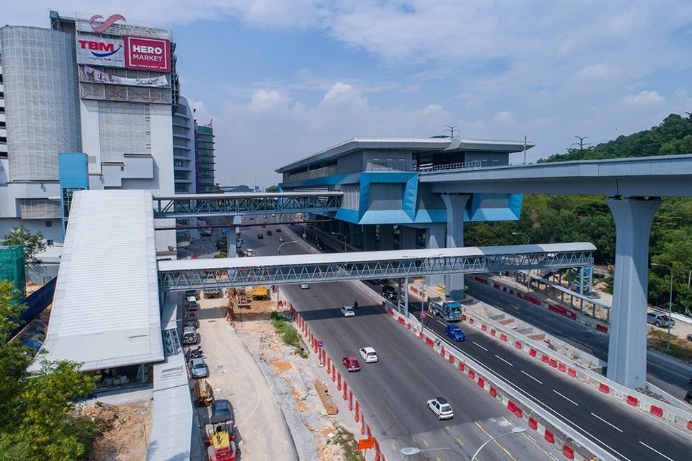 View of the entrance (left) and pedestrian link bridge to the Taman Connaught MRT Station. Jan 2017