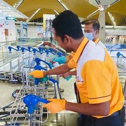 Malaysian airport cleaners diligently wipe down surfaces to protect travellers from Wuhan virus