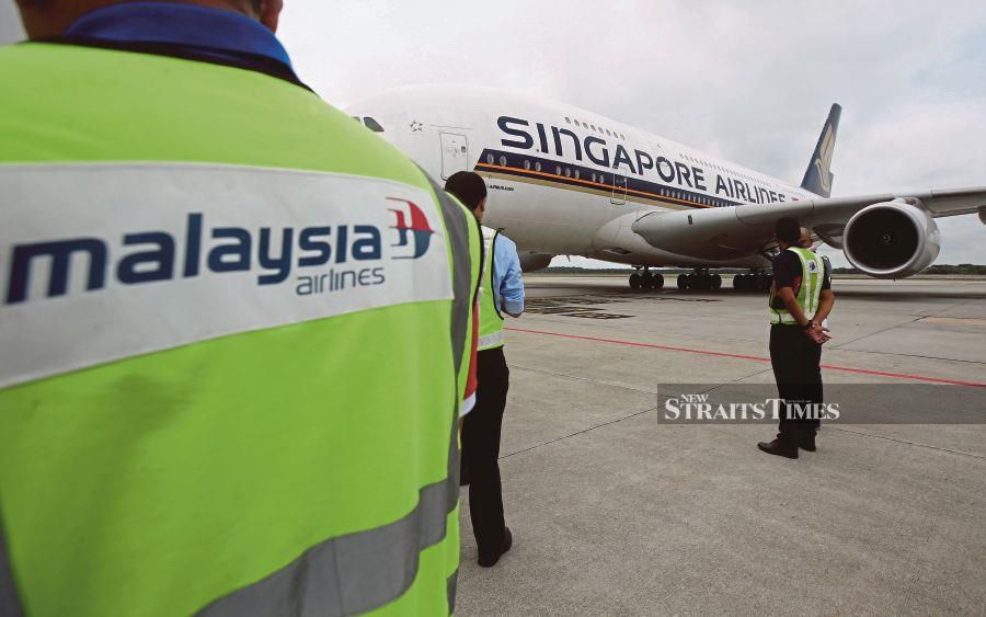 An Airbus A380 belonging to Singapore Airlines being returned to the airline after undergoing maintenance at the Kuala Lumpur International Airport. -File pic