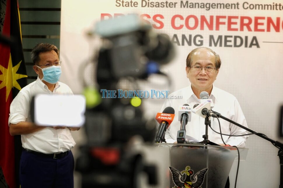 Uggah speaking at the press conference today. Also seen is Local Government and Housing Minister Dato Sri Dr Sim Kui Hian. – Photo by Chimon Upon