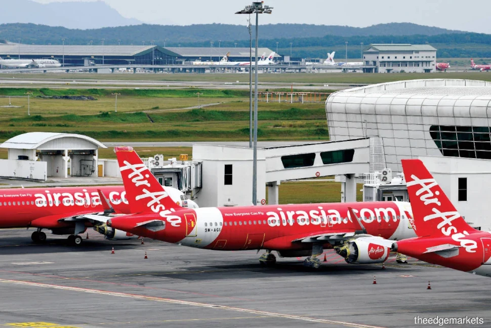 AirAsia aircraft at KLIA ... With some form of restructuring happening in Thailand, Malaysia and India, Indonesia AirAsia and AirAsia Philippines could be next in line. (Photo by Suhaimi Yusuf/TheEdge)