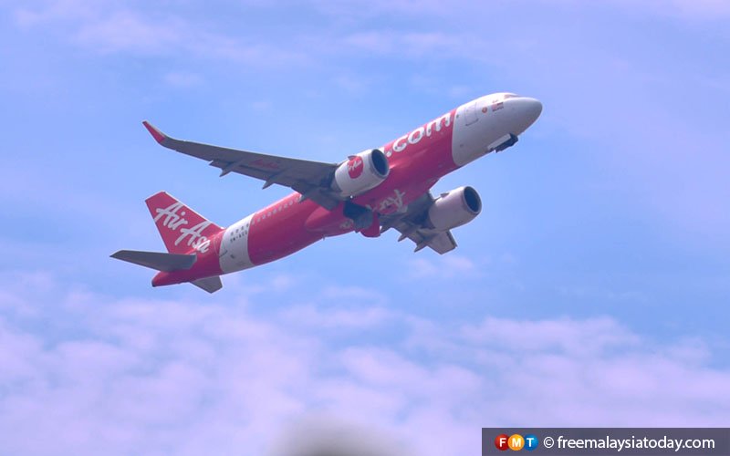 AirAsia flight on the sky