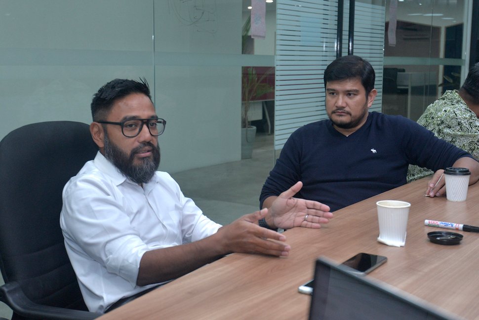 AirAsia X chief executive officer, Benyamin Ismail, and AirAsia Bhd chief executive officer, Riad Asmat, during a visit to Malay Mail offices in Petaling Jaya October 31, 2019. — Picture by Shafwan Zaidon