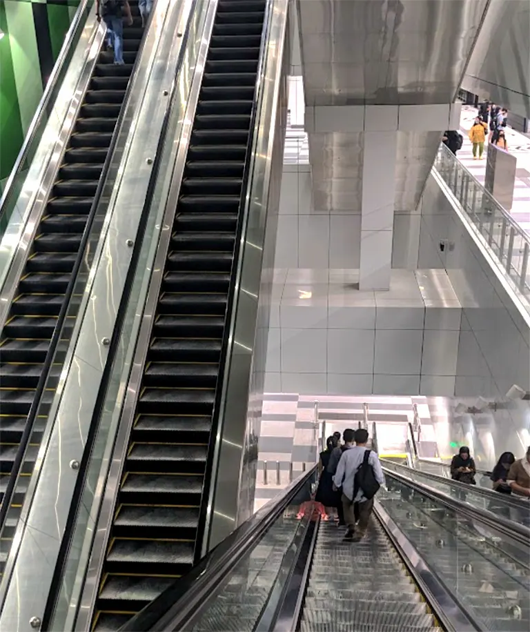 Escalators for movement between the Concourse level and Boarding platforms at Damansara Damai MRT station