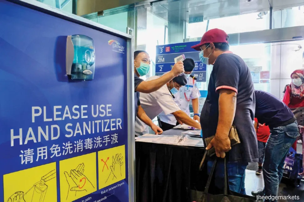 Passengers being tested at klia2. MAHB is understood to be looking at testing as many as 20,000 passengers — 10,000 each at KLIA and klia2 — on a daily basis, for a start. (Photo by Bloomberg)