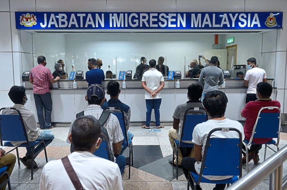 Exit strategy: Special counters at KLIA in Sepang are open 24 hours to enable illegal immigrants to leave Malaysia under the repatriation recalibration programme. — Bernama