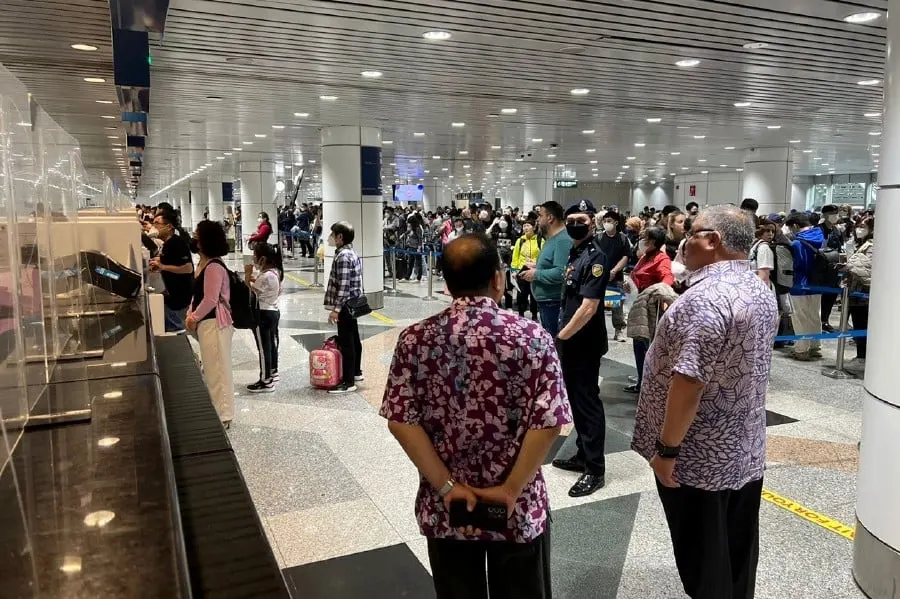 Incoming travelers making long queues at Kuala Lumpur International Airport (KLIA) due to Immigration clearance. - Pic courtesy of Tourism Ministry