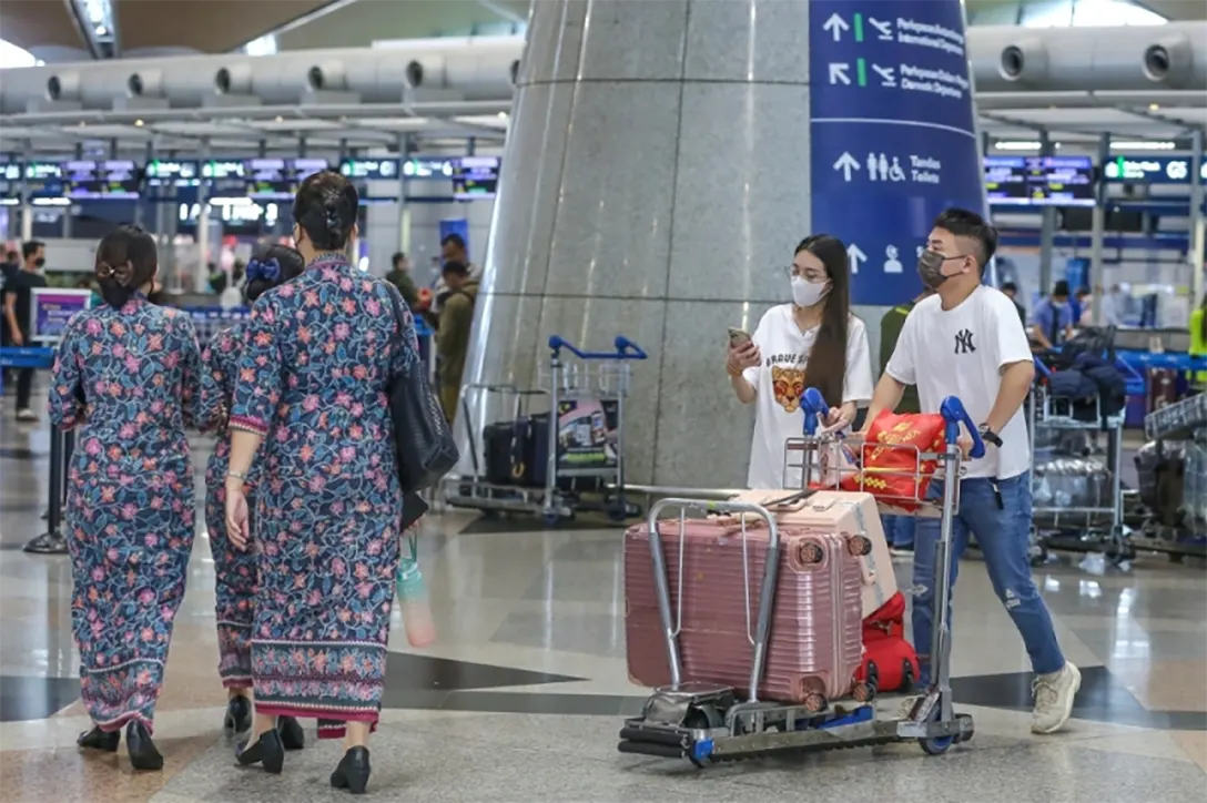 Travellers are seen at the departure hall at the Kuala Lumpur International Airport in Sepang January 10, 2023. — Picture by Yusof Mat Isa