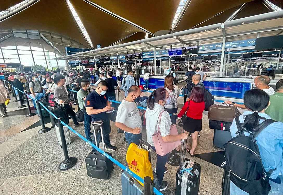 Crowded: A typical view of the inside of KLIA, with long lines at check-in and immigration an inconvenience for travellers both foreign and local. — FAIHAN GHANI/The Star